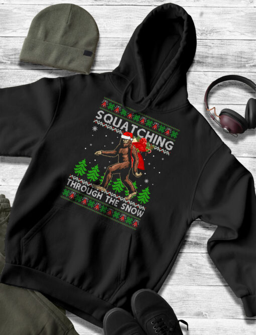 2020-11-Men-Hoodie-Bigfoot-Squatching-Through-The-Snow-Christmas-mockup3-black.jpg