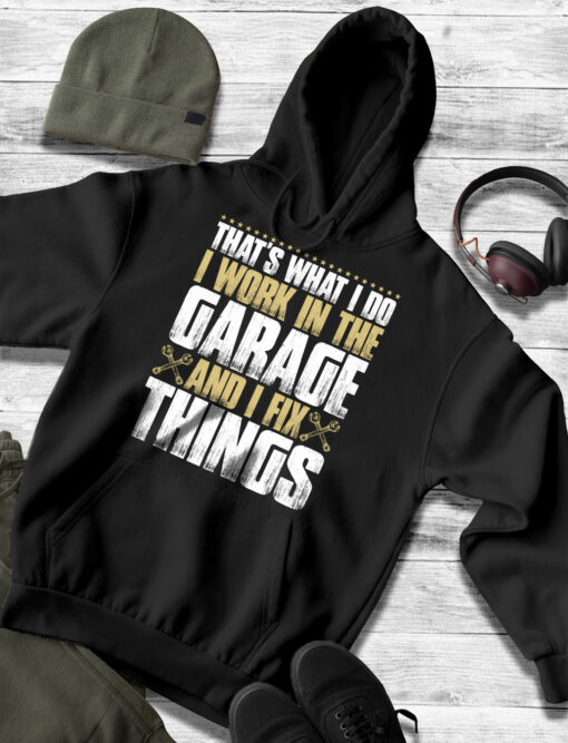 2020-12-Men-Hoodie-I-Work-In-The-Garage-And-I-Fix-Things-Funny-Father-s-Day-mockup3-black.jpg